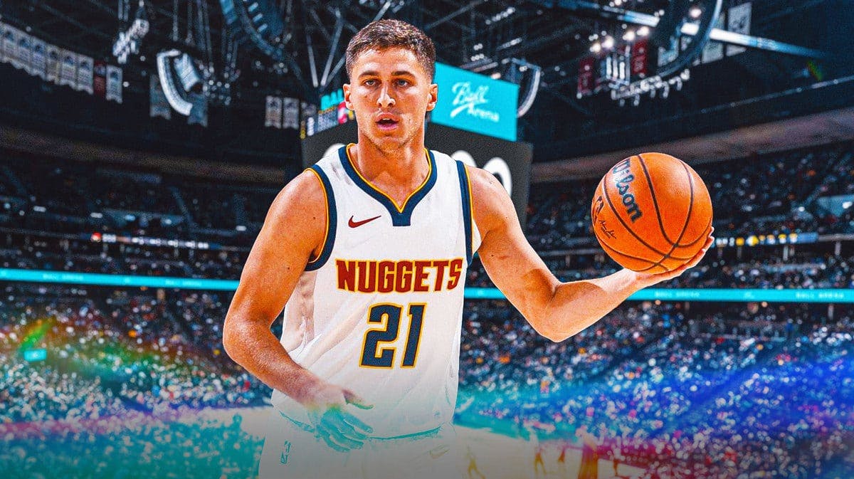 Collin Gillespie with the Nuggets arena in the background