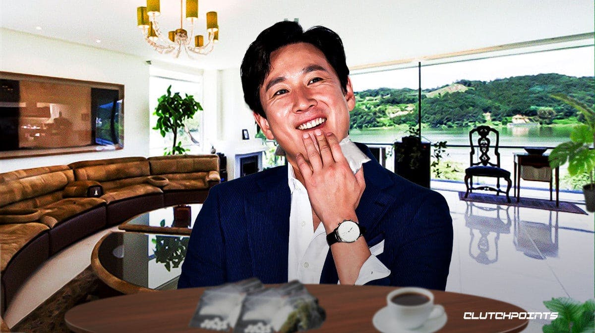 Lee Sun-kyun sitting at a table with possible drugs in front of him.