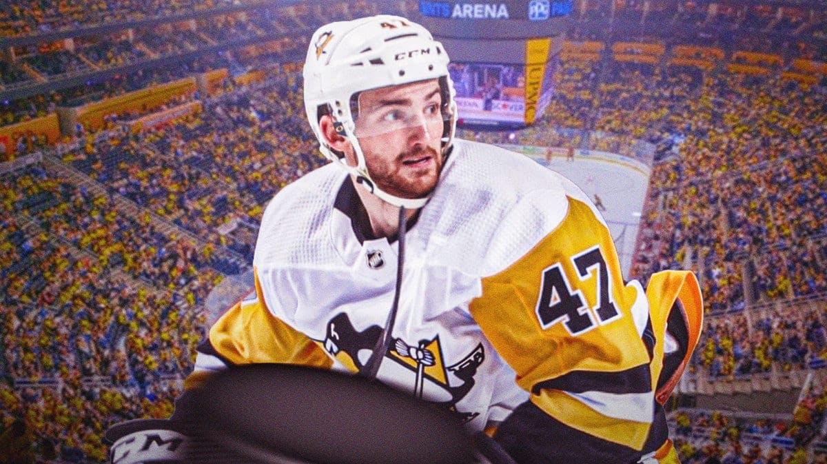 Adam Johnson in his Pittsburgh Penguins gear with a hockey rink in the background and hockey puck in the foreground