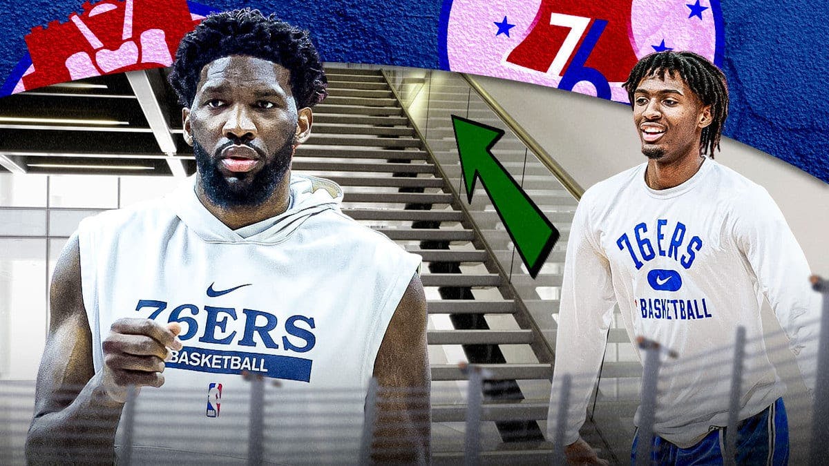 Sixers players Joel Embiid and Tyrese Maxey standing next to a flight of stairs with a green arrow pointing up it