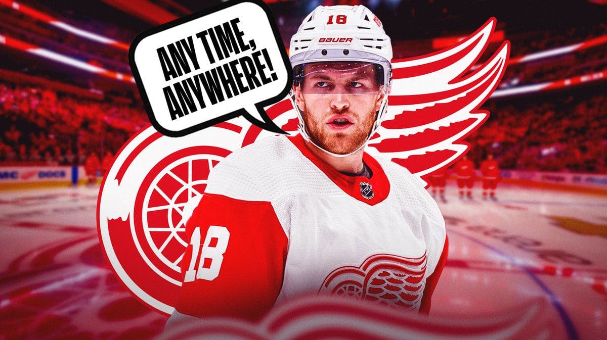 Detroit Red Wings forward Andrew Copp with a speech bubble saying "any time, anywhere!" The Red Wings logo and home rink can be seen in the background