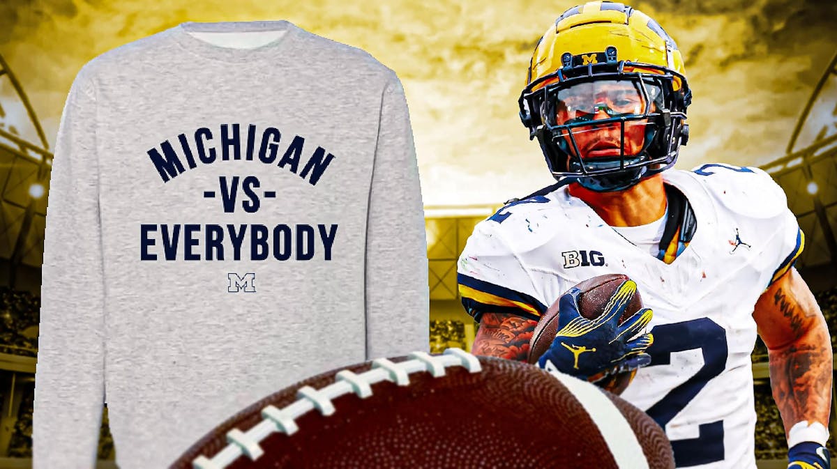 Michigan football player Blake Corum on the right. On the left, a sweatshirt saying "Michigan vs. Everybody."