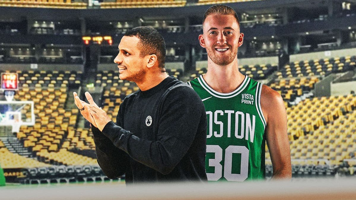 Joe Mazzulla and Sam Hauser looking happy/smiling on a TD Garden background