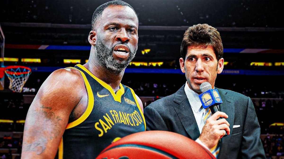 Draymond Green looking angry next to an announcer.