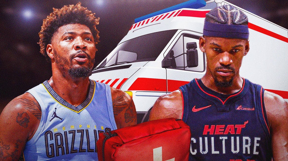 Memphis Grizzlies star Marcus Smart and Miami Heat star Jimmy Butler in front of an ambulance.