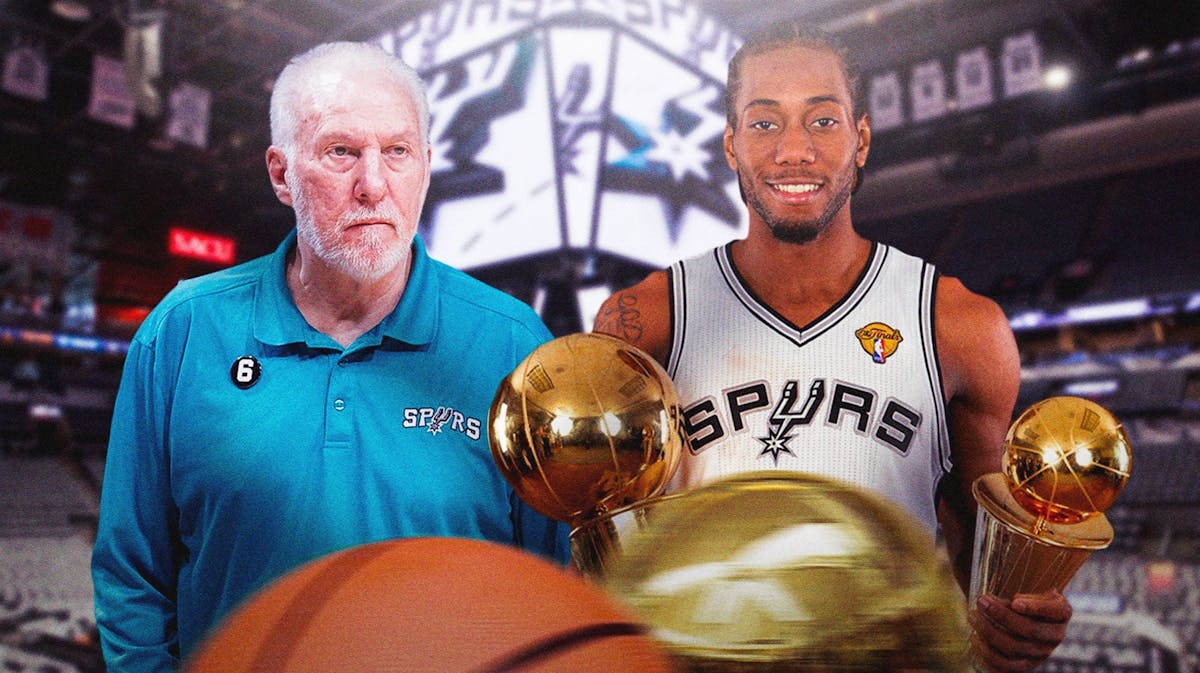 Spurs coach Gregg Popovich with Kawhi Leonard holding trophies