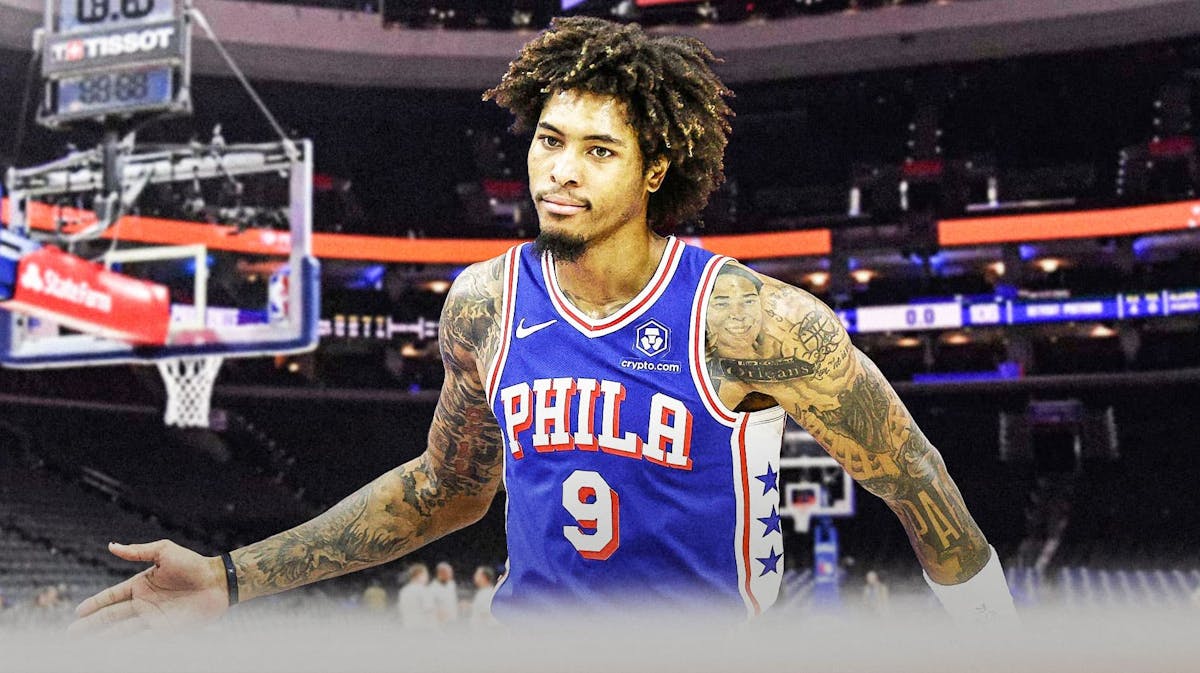 Kelly Oubre Jr with the Sixers arena in the background