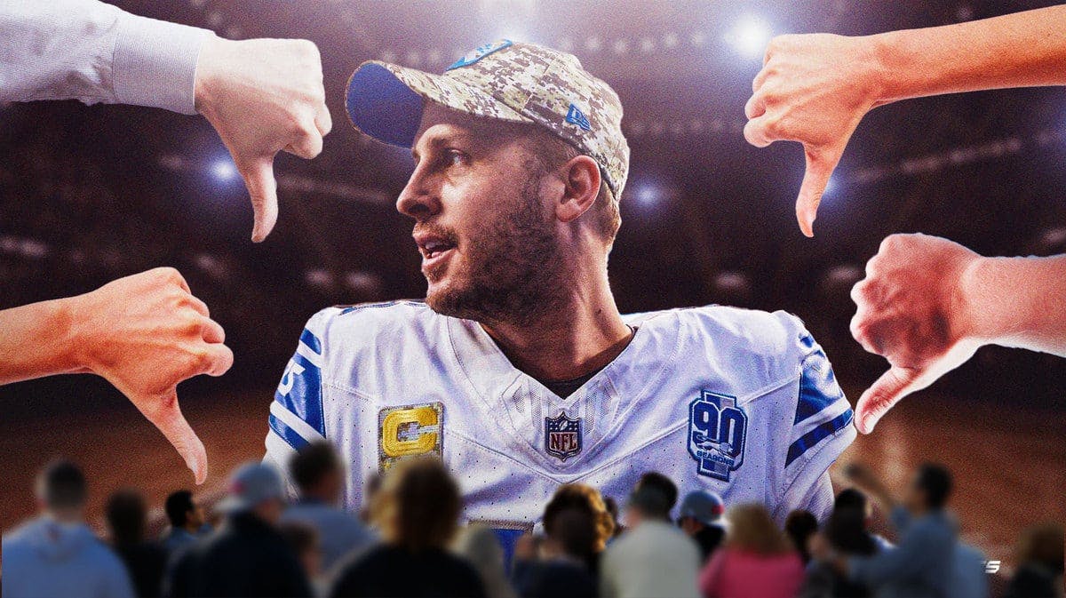 Lions' Jared Goff with thumbs downs around him