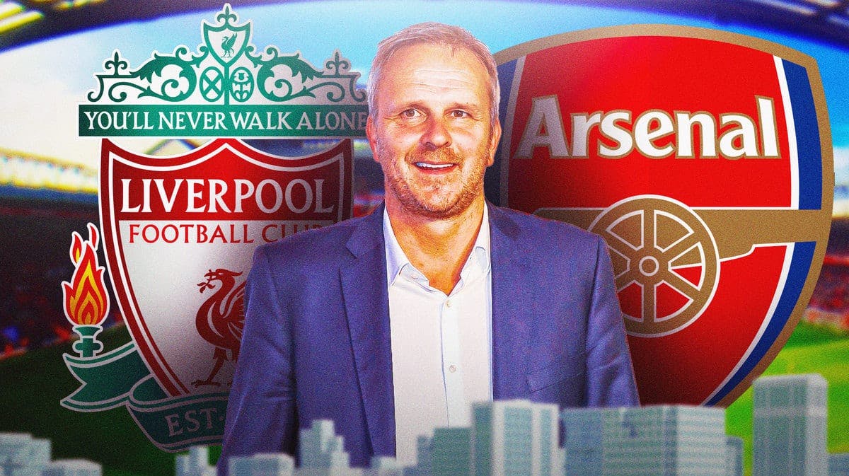 Didi Hamann laughing in front of the Liverpool and Arsenal logos