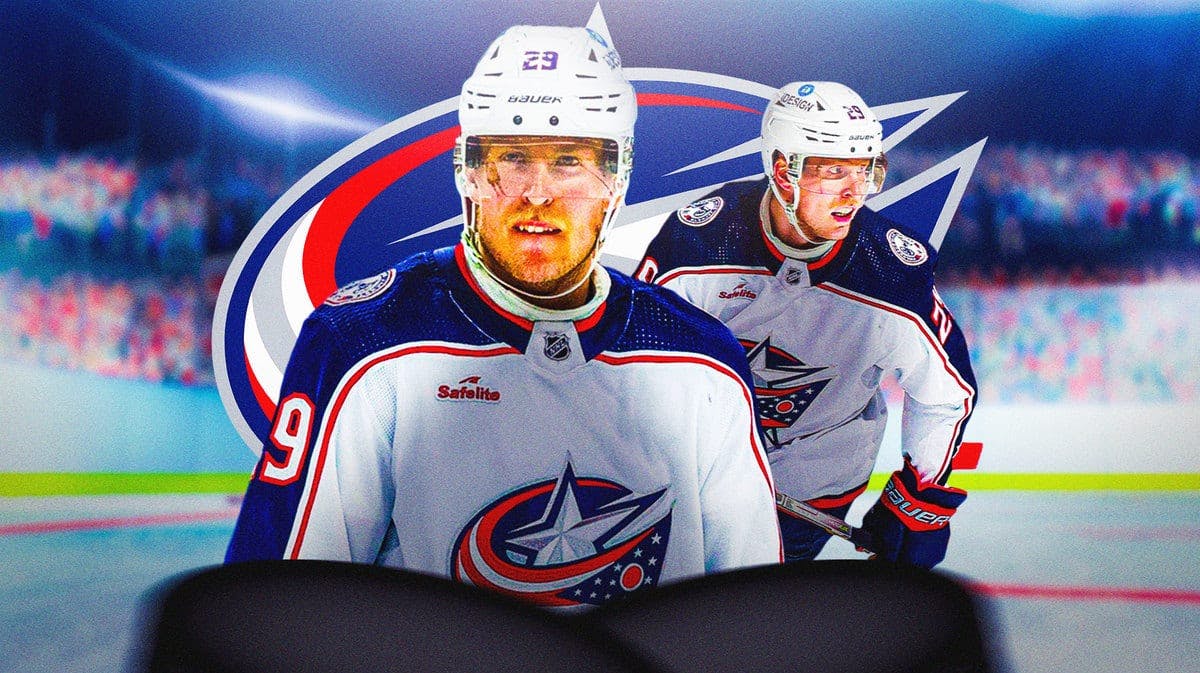 Patrick Laine in middle of image looking upset, hockey rink in background, Columbus Blue Jackets logo