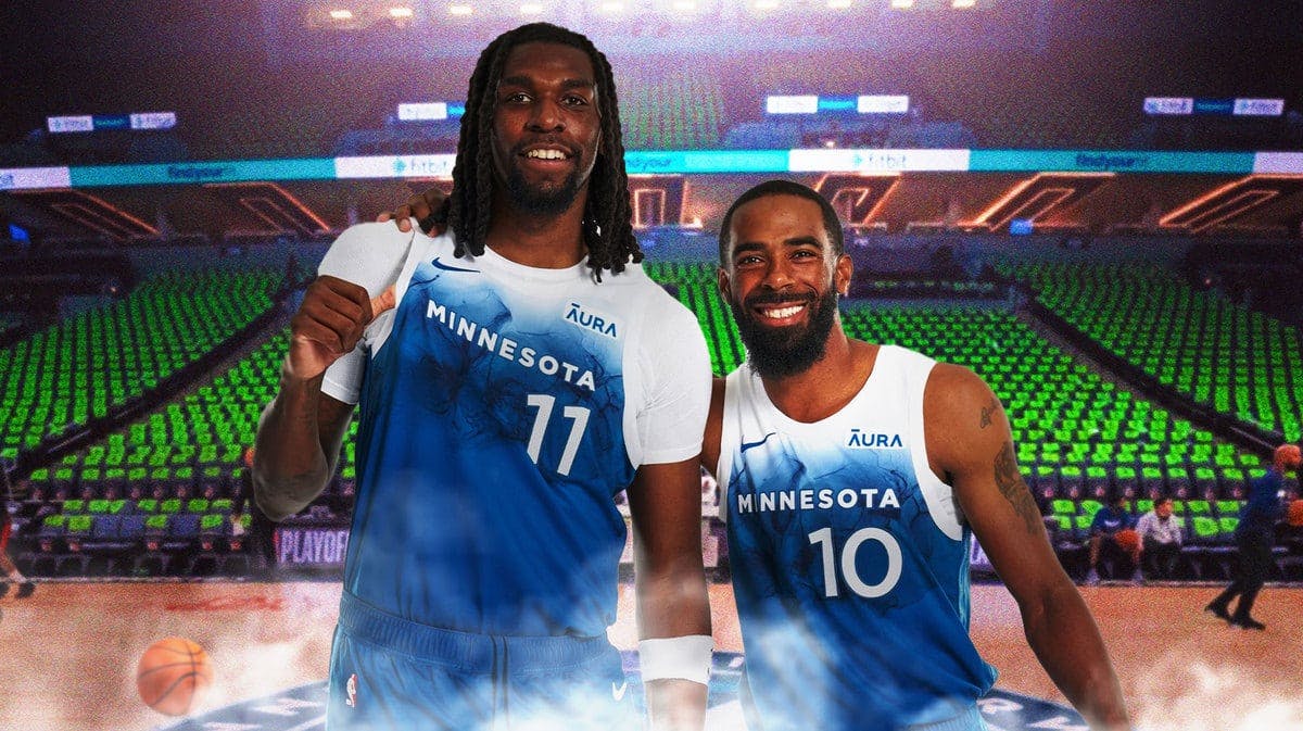 Naz Reid and Mike Conley wearing the 2023-24 city jerseys inside of Target Center.