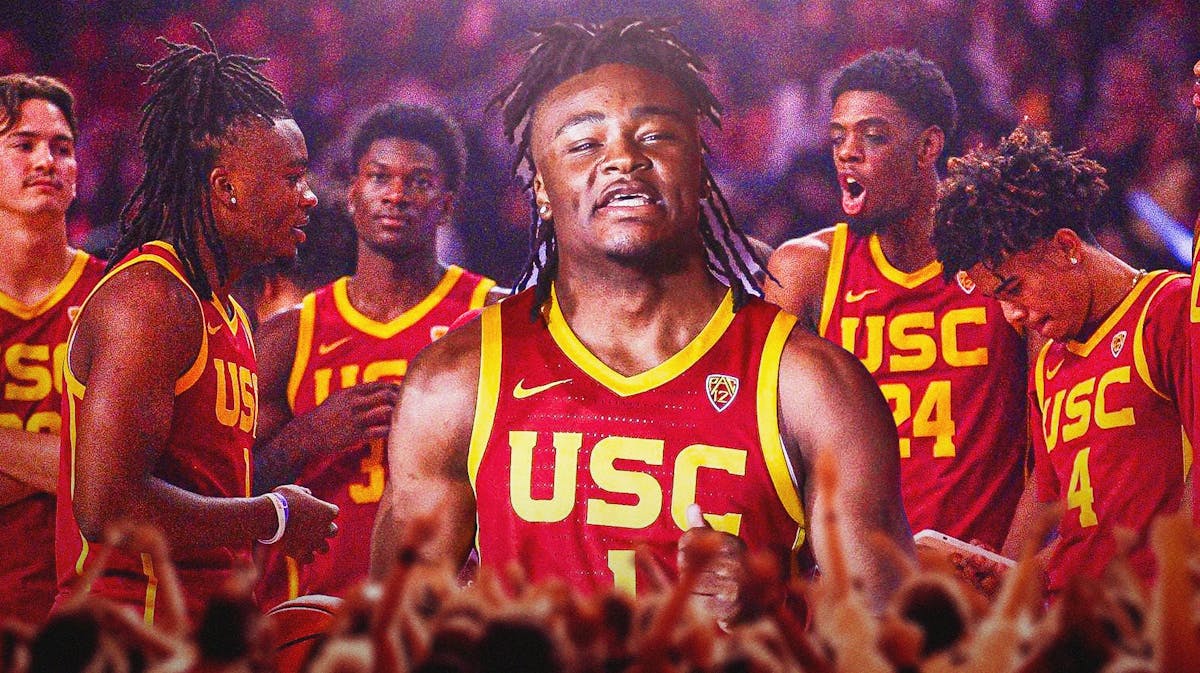 USC's Isaiah Collier in the foreground and other players in the background celebrating.