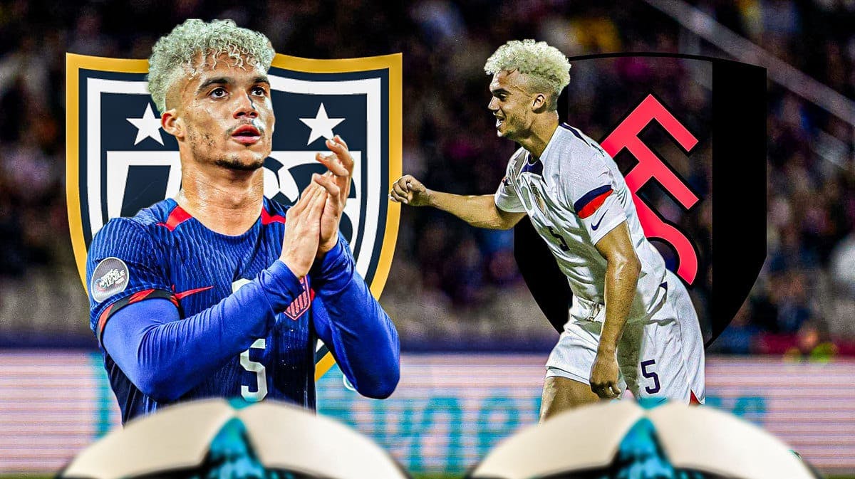 Antonee Robinson celebrating in front of the USMNT and Fulham logos
