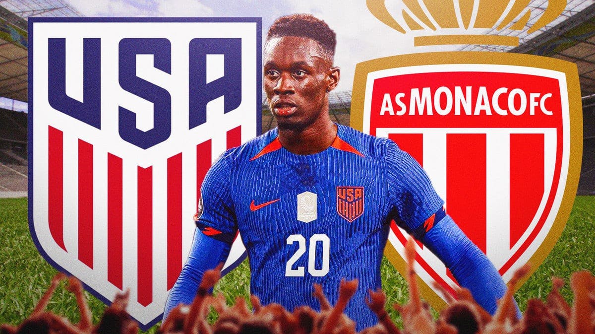 Folarin Balogun celebrating in front of the AS Monaco and USMNT logos