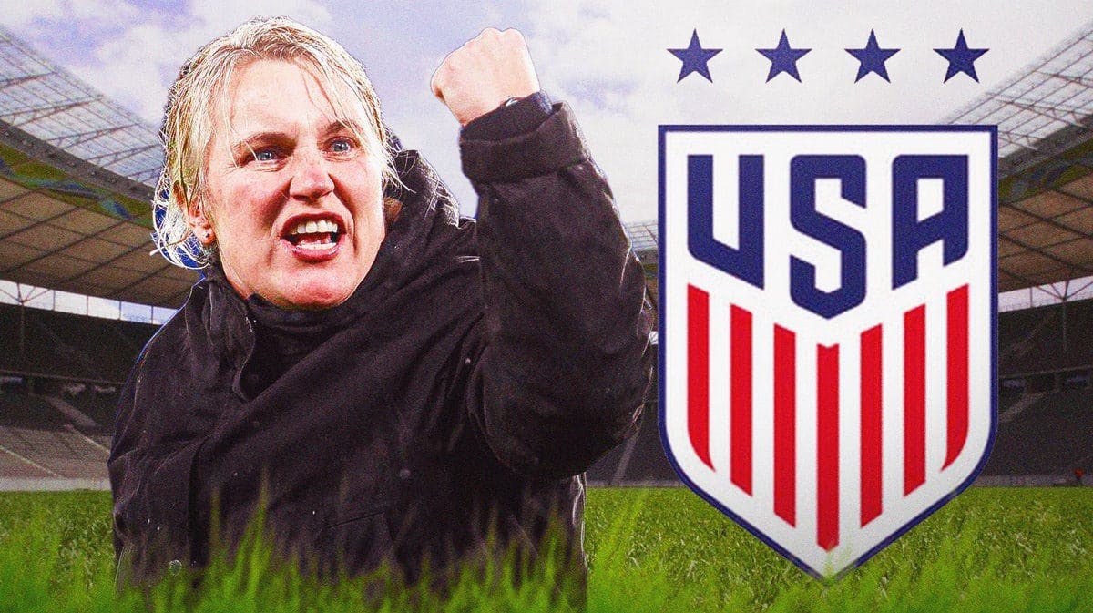 Emma Hayes in front of the USWNT logo