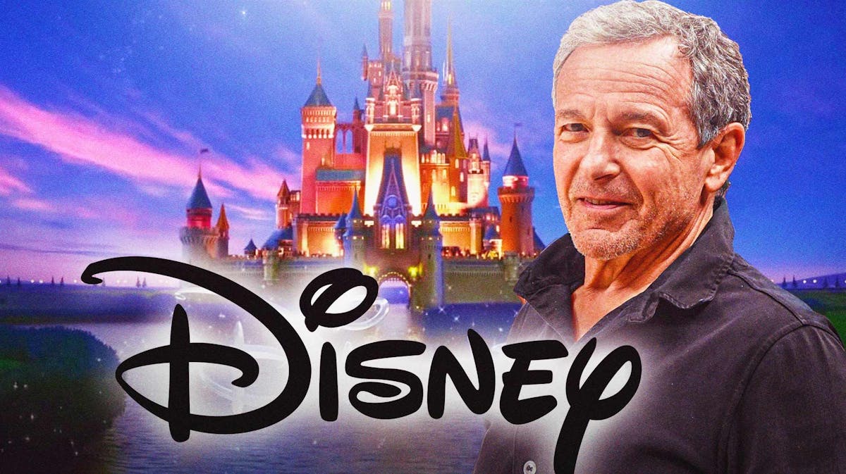 Bob Iger and Disney logo in front of castle logo.
