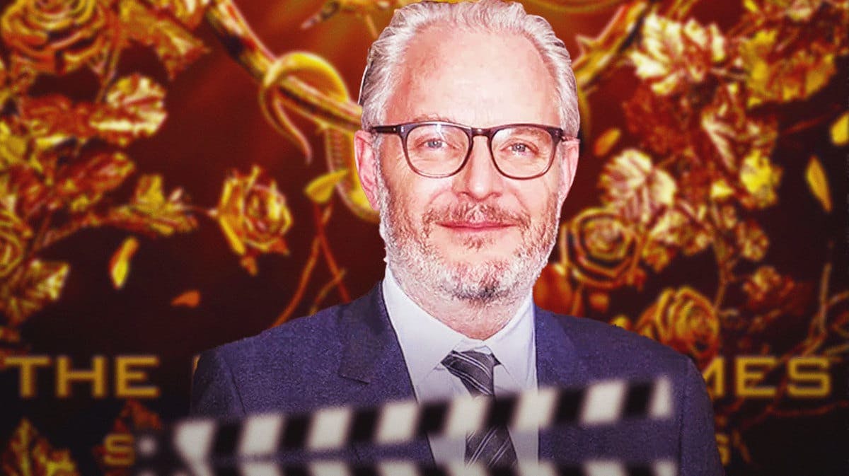 Director Francis Lawrence with a Hunger Games: The Ballad of Songbirds and Snakes behind him.