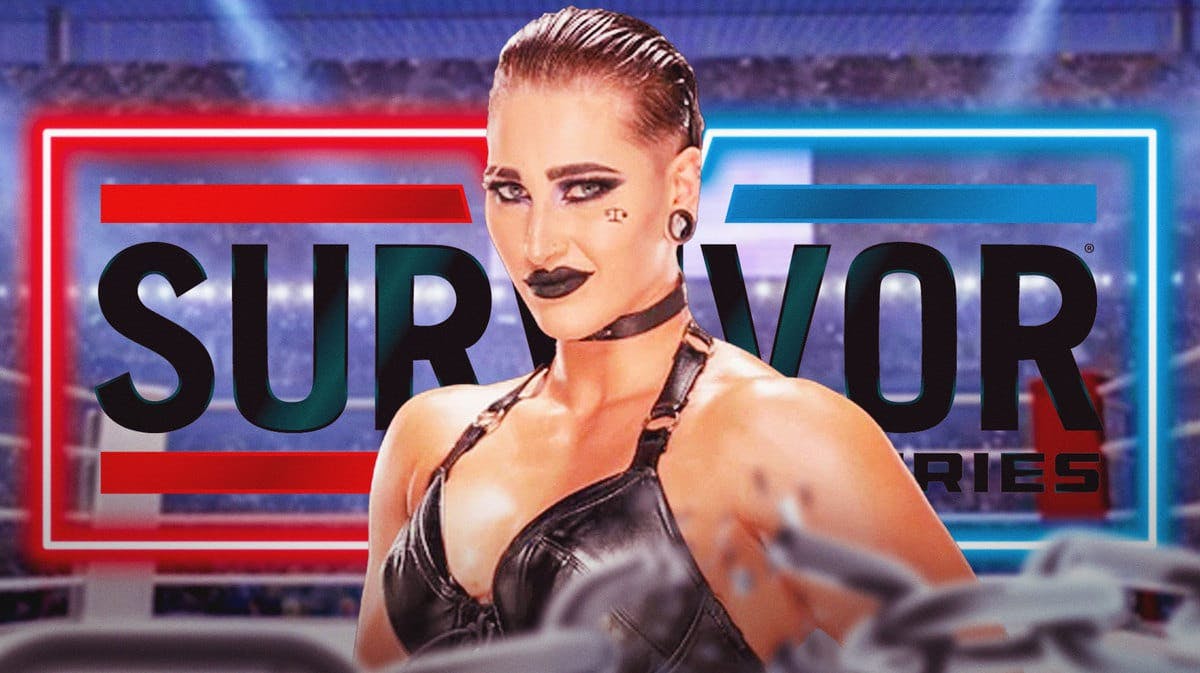 Rhea Ripley in front of the 2023 Survivor Series logo.