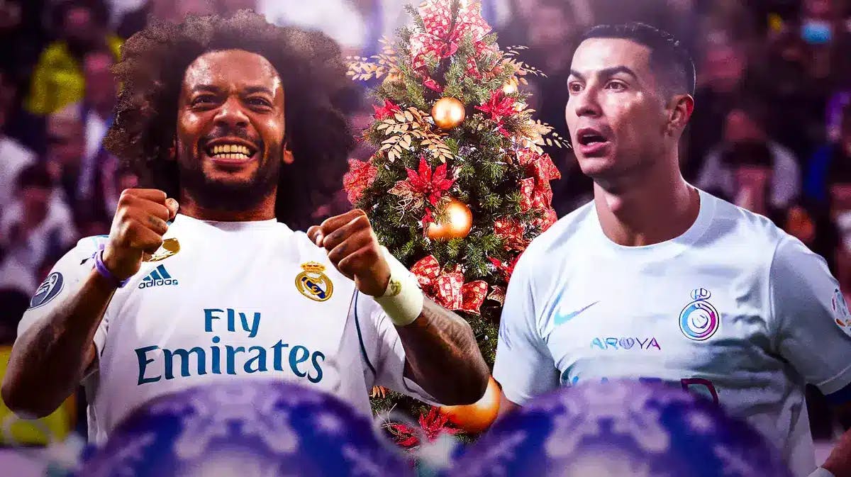 Cristiano Ronaldo and Marcelo in front of a Christmas tree