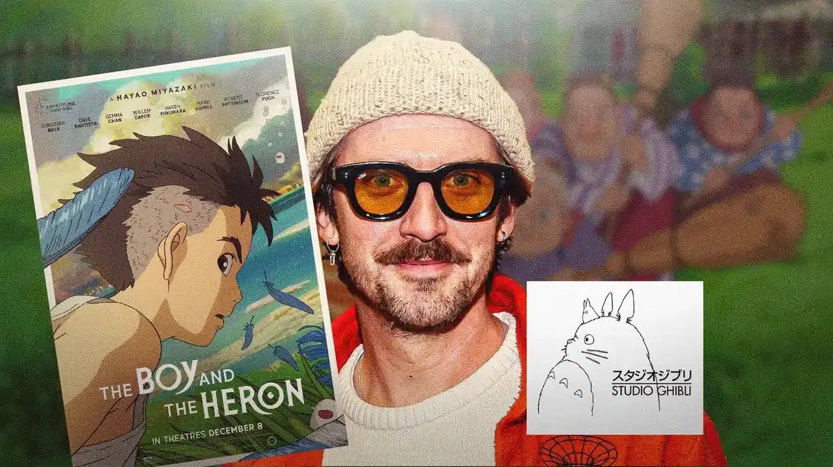 Dan Stevens with The Boy and the Heron poster and Studio Ghibli logo.
