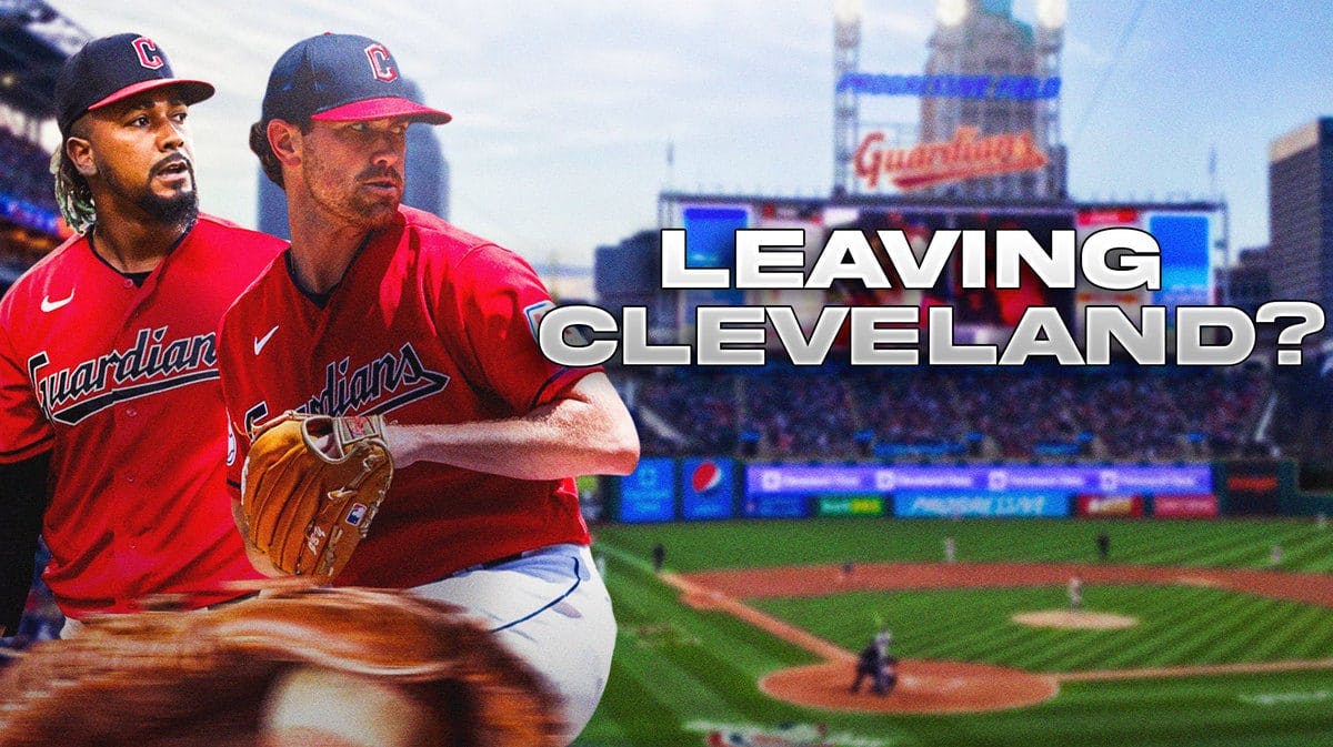 Guardians' Emmanuel Clase, Guardians' Shane Bieber next to a sign. On the sign, write: LEAVING CLEVELAND?