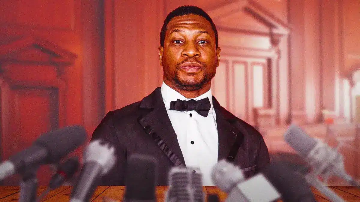 Jonathan Majors with courtroom background.