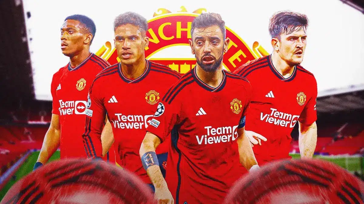Bruno Fernandes, Raphael Varane, Harry Maguire and Anthony Martial in front of the Manchester United logo