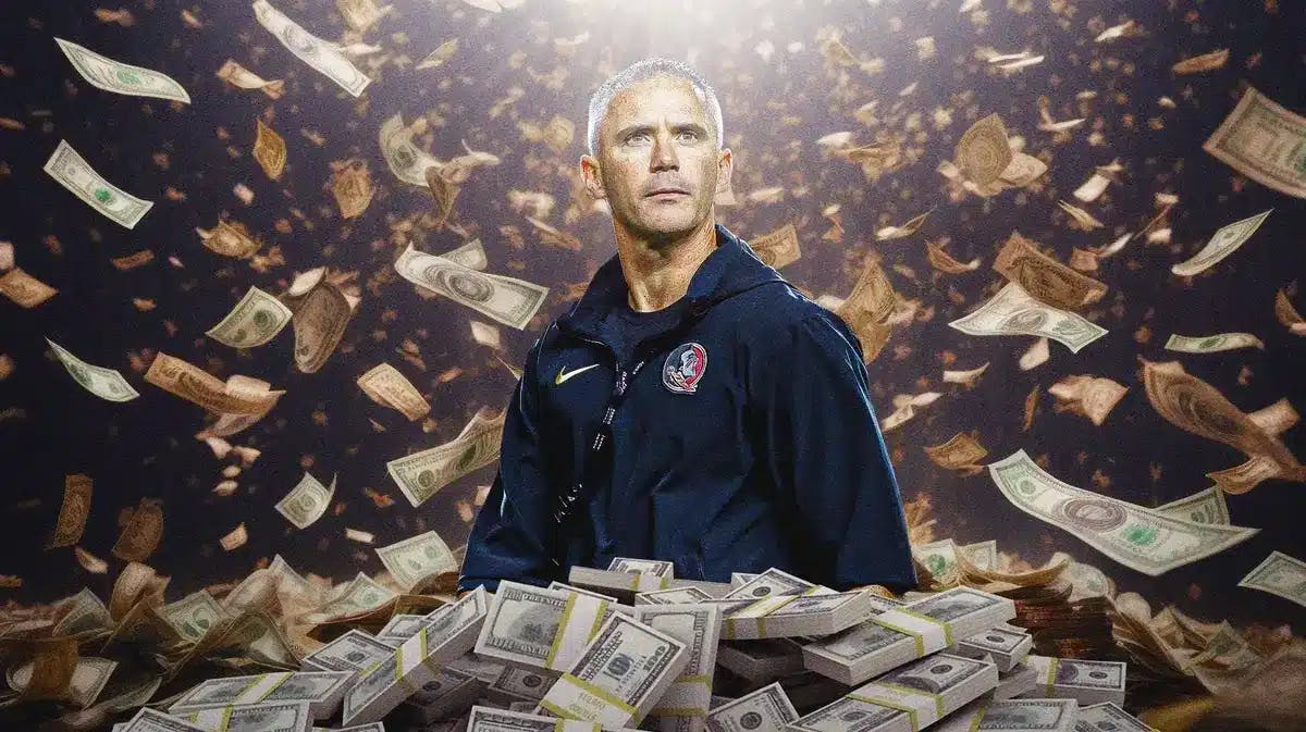Florida State coach Mike Norvell surrounded by piles of cash.