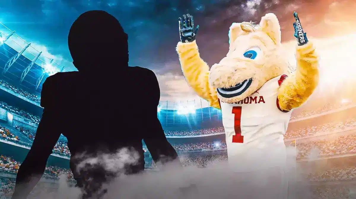 ACTION SHOT silhouette of Sam Franklin (runing back for UT-Martin) with Oklahoma football mascot