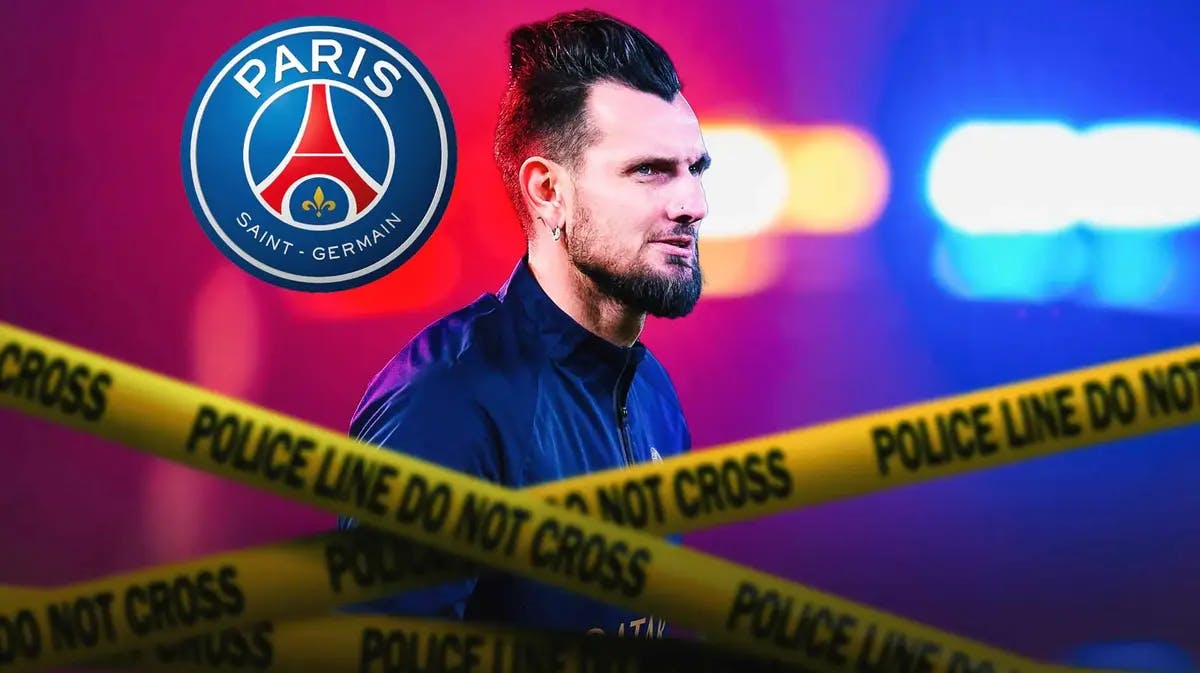 Alexandre Letellier behind police lines, the PSG logo in the sky