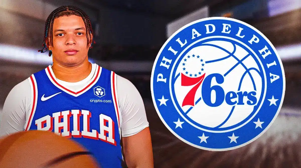 Photo: Kenneth Lofton in Sixers uniform with Sixers logo in the back