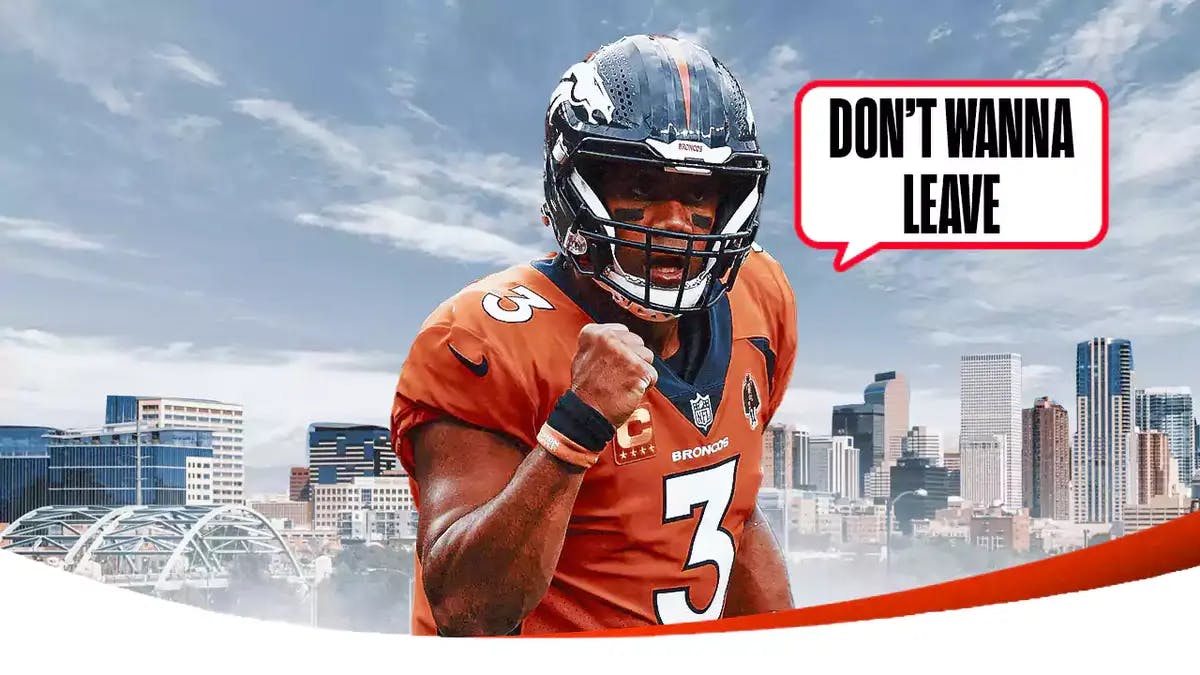 Photo: Russell Wilson saying “Don’t wanna leave” have the Denver skyline as the background