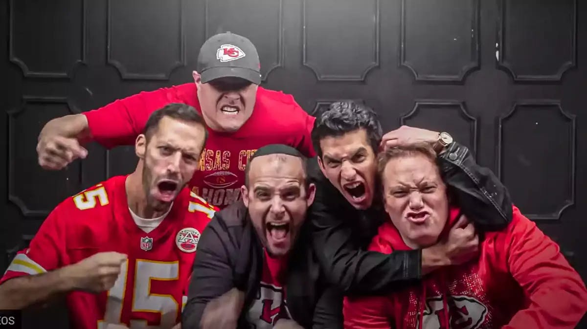 Still shot of Six13 decked out in Chiefs attire from their Taylor Swift parody video for Chanukah