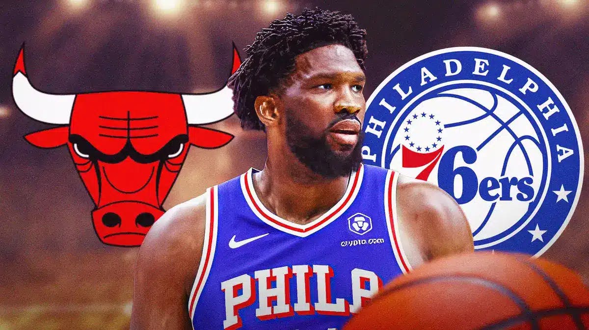 Joel Embiid in front of Sixers and Bulls logo