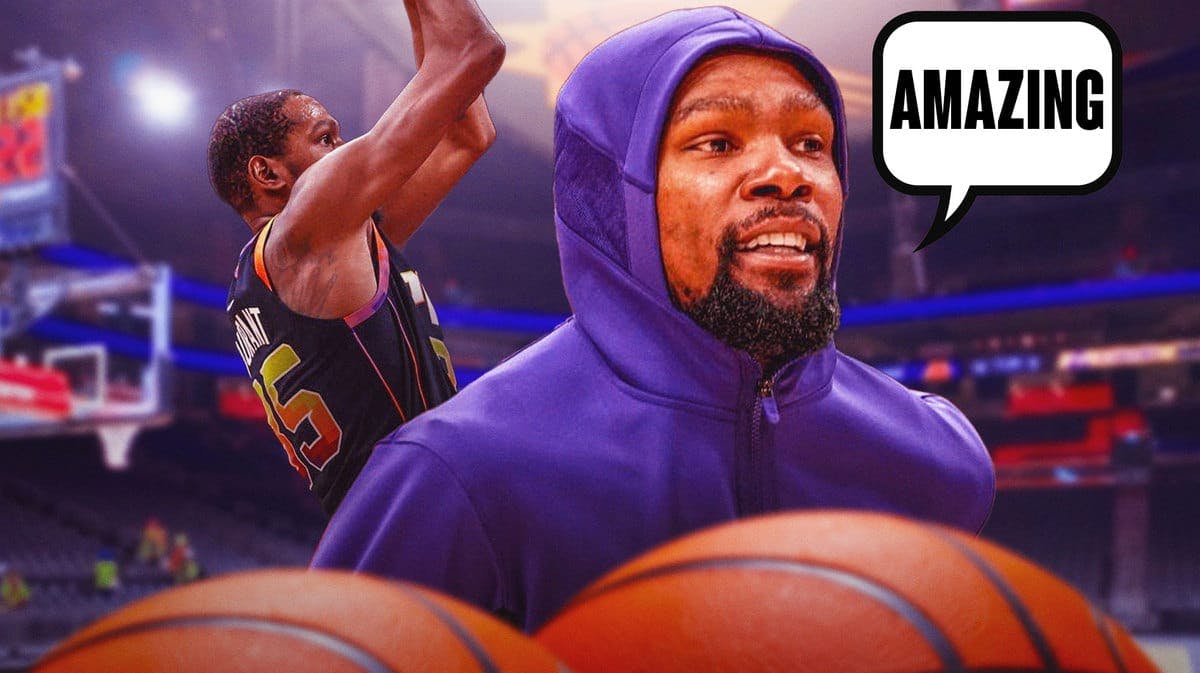 Photo: Kevin Durant smiling in Suns jersey in action saying “Amazing”