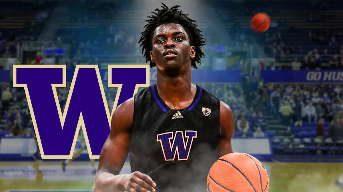 Zoom Diallo in a Washington Huskies jersey with the Washington logo in the background