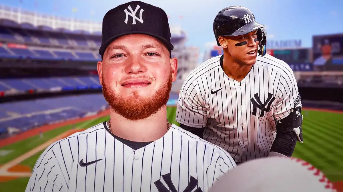 Alex Verdugo in a Yankees uniform. Yankees' Aaron Judge next to him