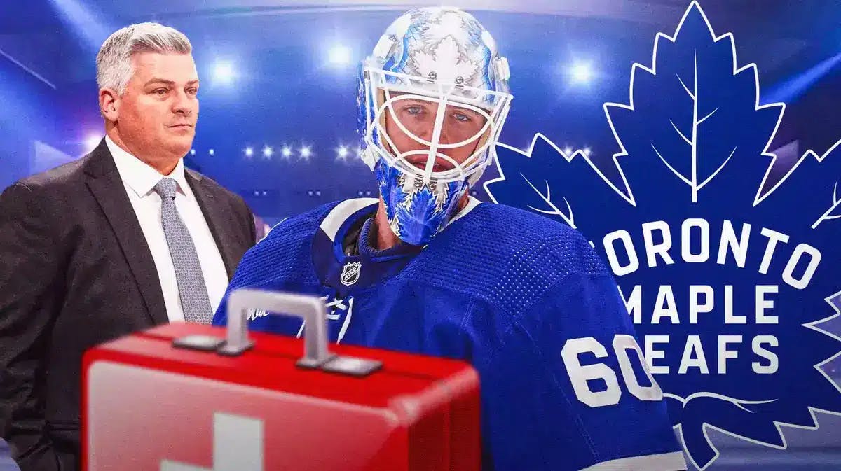 Joseph Woll in middle of image looking stern with first aid kit, hockey rink in background, Sheldon Keefe also in image looking stern, TOR Maple Leafs logo
