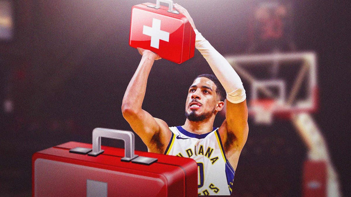 Tyrese Haliburton of the Pacers shooting a ball but with medical cross symbol on the ball