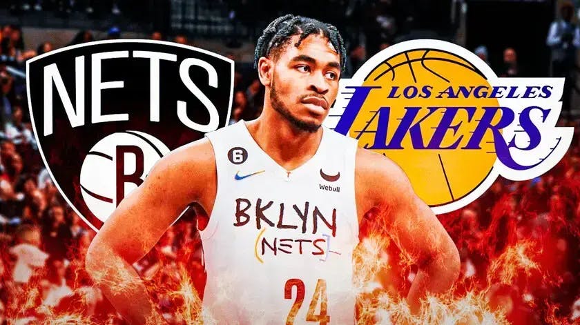 Cam Thomas in middle of image looking happy with fire around him, Nets and Lakers logo on each side, basketball court in background
