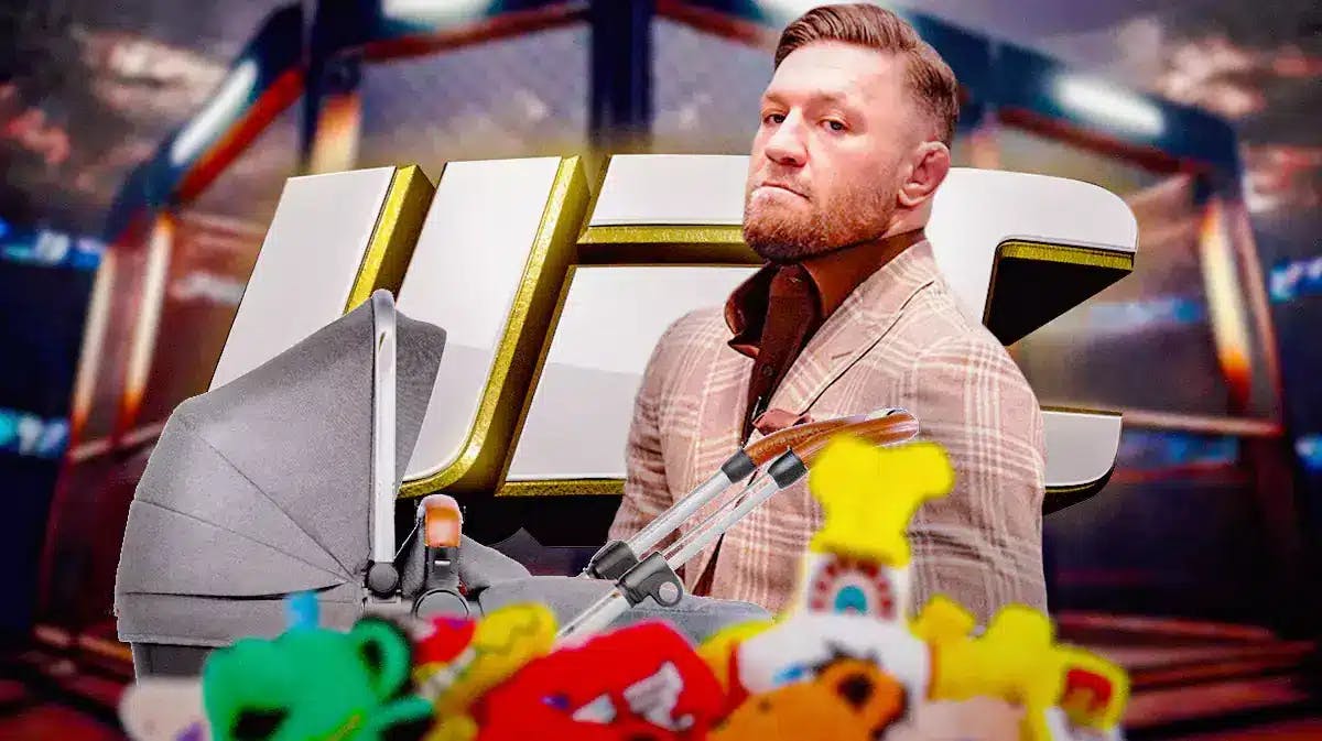 Conor McGregor with a baby stroller, the UFC logo behind him