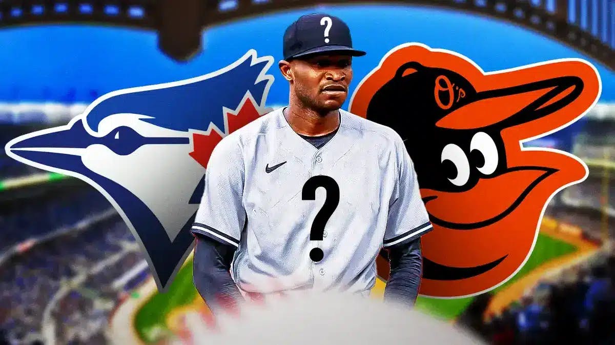 Domingo German wearing a mystery jersey with a Blue Jays and orioles logo over his shoulders. Background is Yankee Stadium, thanks