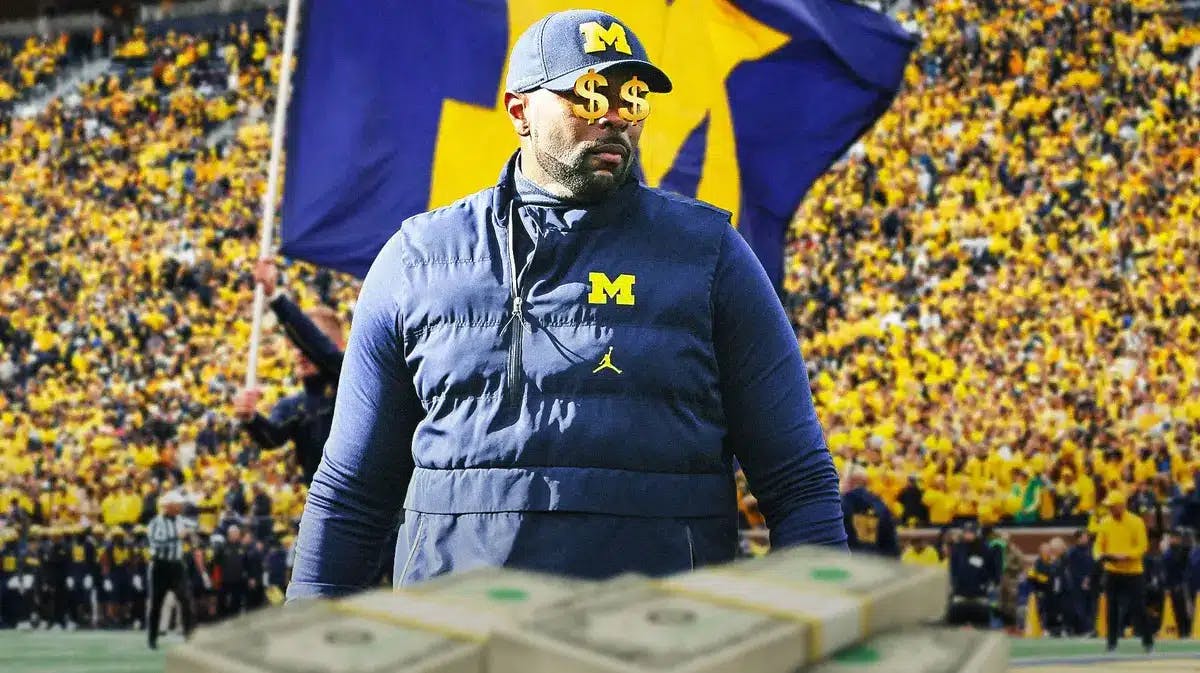 New Michigan football head coach Sherrone Moore with dollar signs in eyes