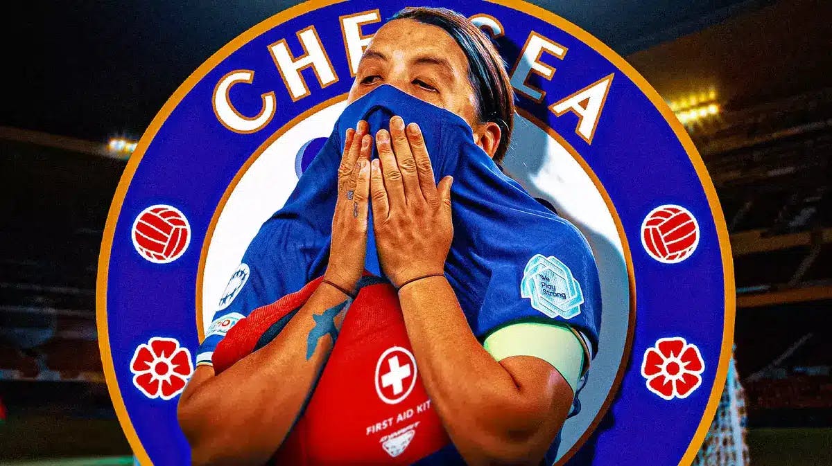 Sam Kerr in pain/injured in front of the Chelsea logo