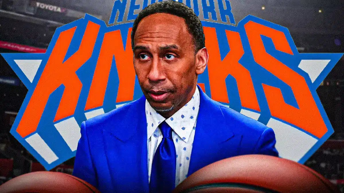 Photo: Stephen A. Smith with suit on and Knicks logo in the background