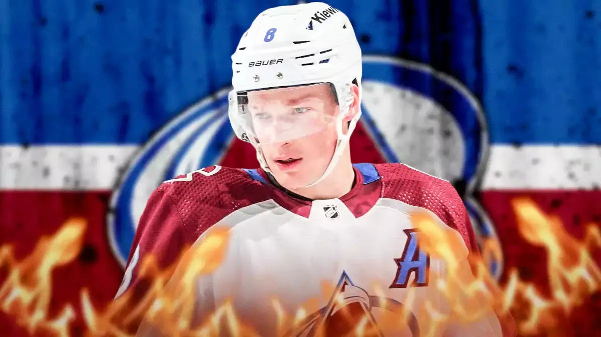 Cale Makar in middle of image looking happy with fire all around him, COL Avalanche logo, hockey rink in background