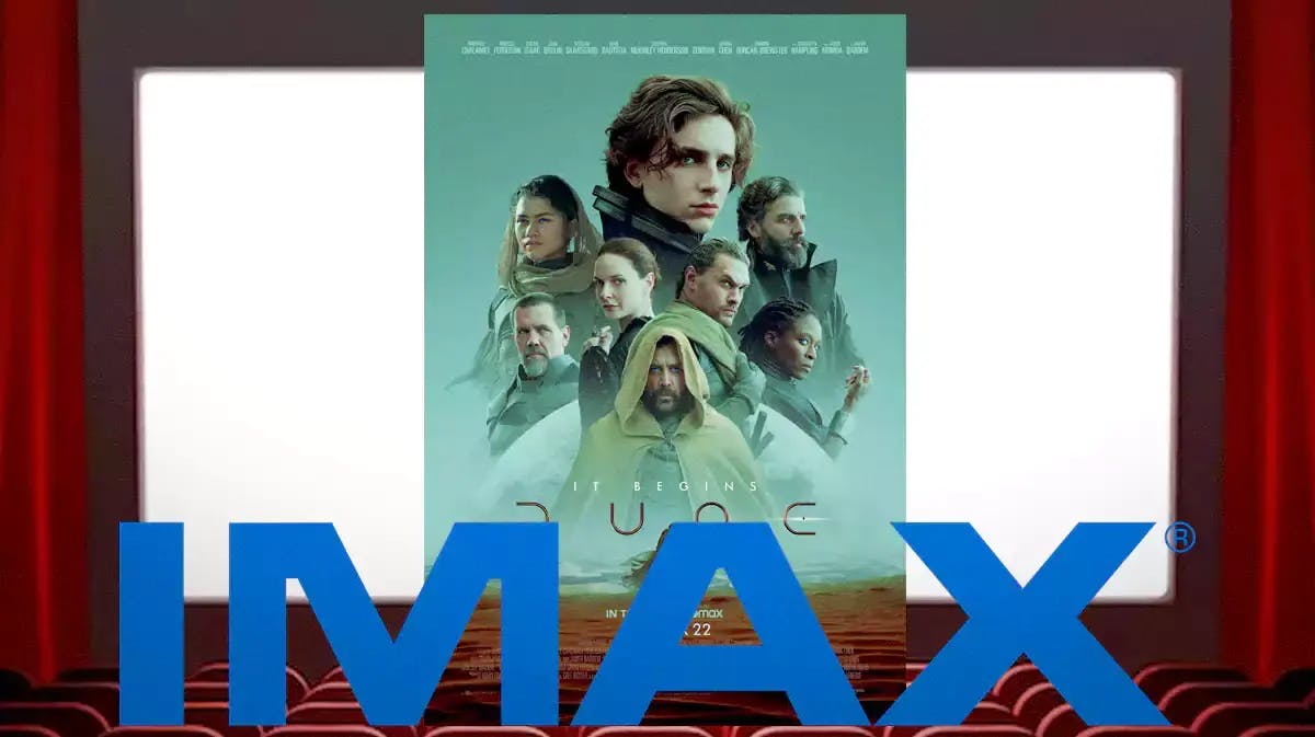 Dune poster with IMAX logo on movie theater screen.