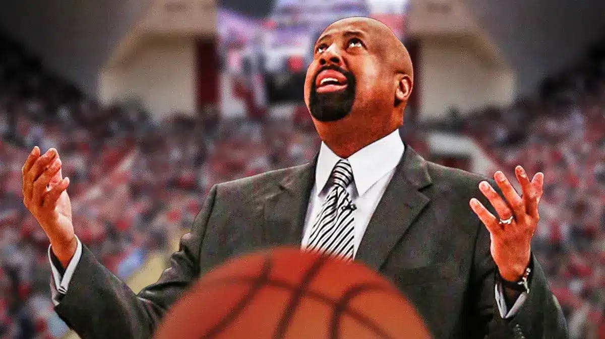 Indiana basketball coach Mike Woodson frustrated, with hands in the air.