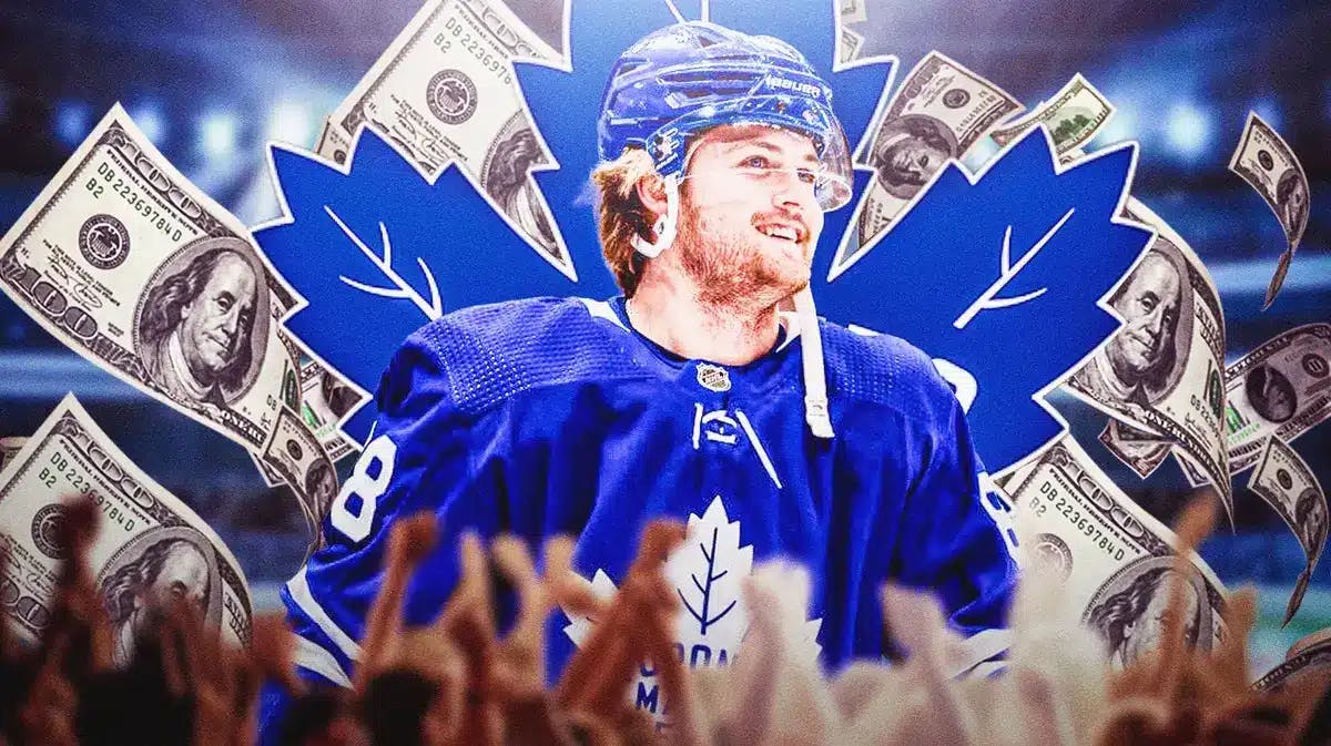 William Nylander in middle of image looking happy, money all around him, TOR Maple Leafs logo, hockey rink in background