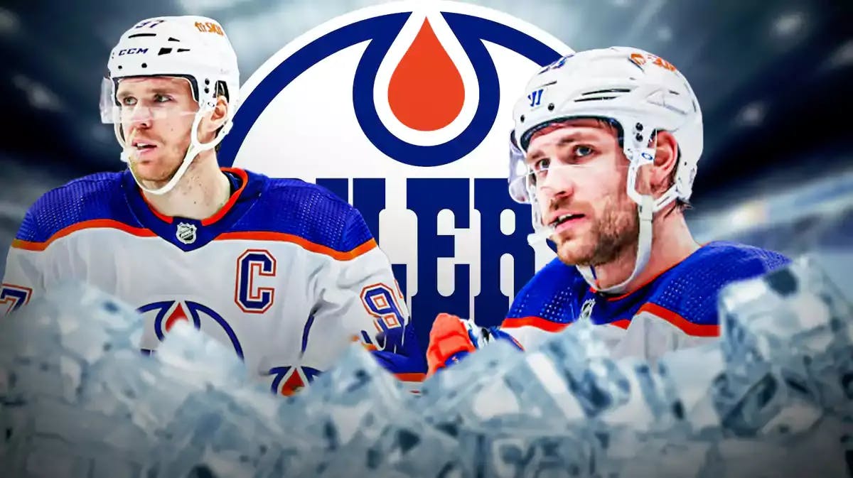 Leon Draisaitl and Connor McDavid on either side looking happy with fire around them, EDM Oilers logo in middle, hockey rink in background